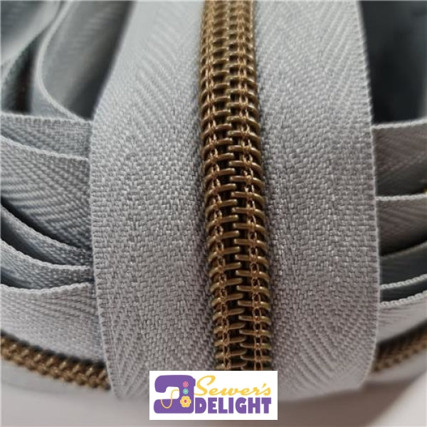 Zipper Tape Grey With Antique Brass Zips By The Metre